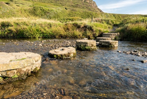 Preview: Solid Stepping Stones Take The South West Coast Path Across A River In North Devon
