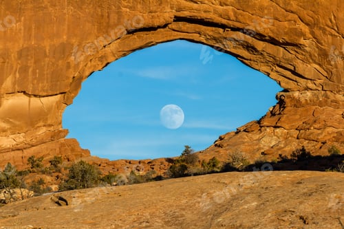 Preview: Beautiful View Of The Full Moon Rising Thru North Window In Arches National Park