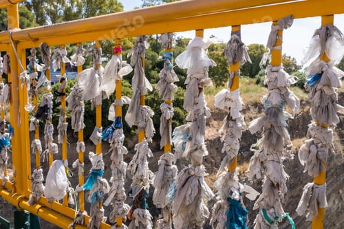 Preview: Tied Cloths And Plastic Bags Expressing Love On Bridge Over Corinth Canal Near Athens