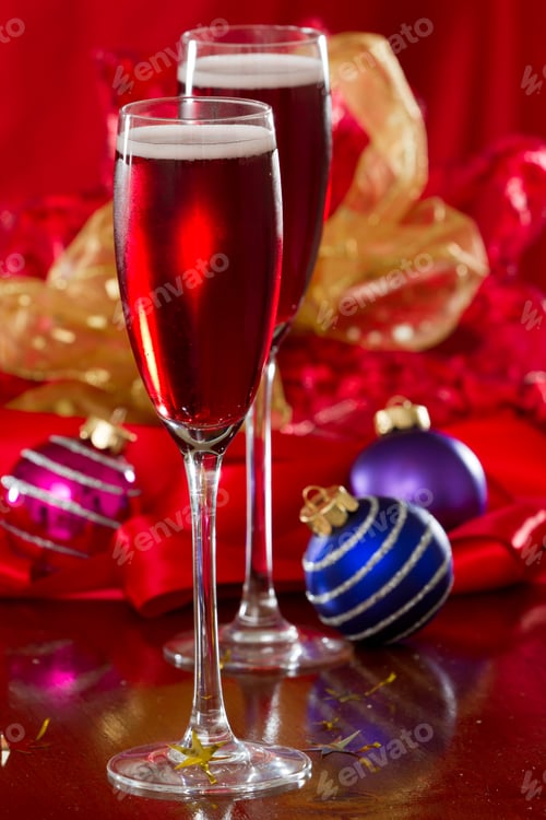 Preview: Sparkling Wine Served For Christmas On A Table With Decorations And Ornaments