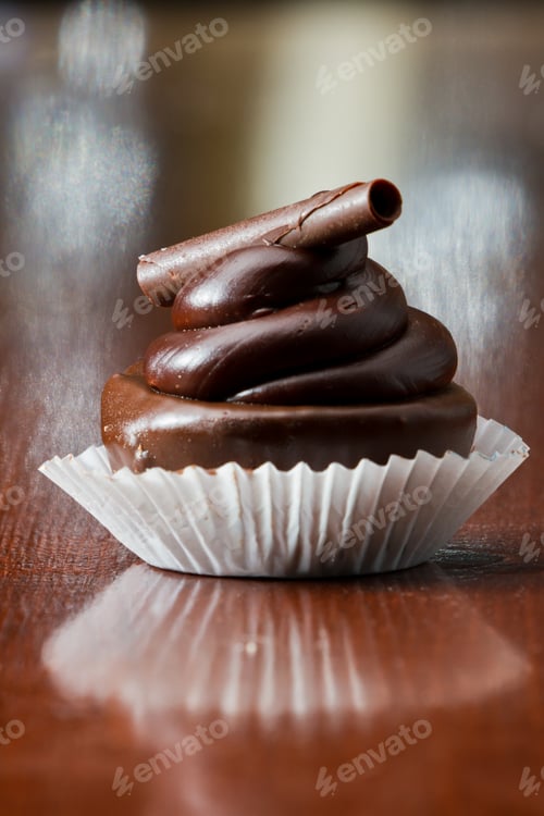Preview: Bite Size Brownie Served Isolated On A Wooden Table