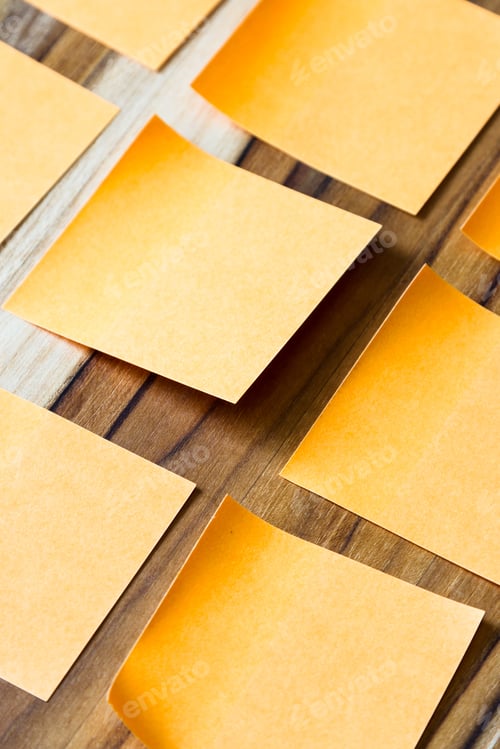 Preview: Sticky Orange Notes On A Wooden Table For An Office To Do Concept