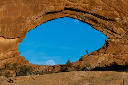 Preview: Beautiful View Of The Full Moon Rising Thru North Window In Arches National Park