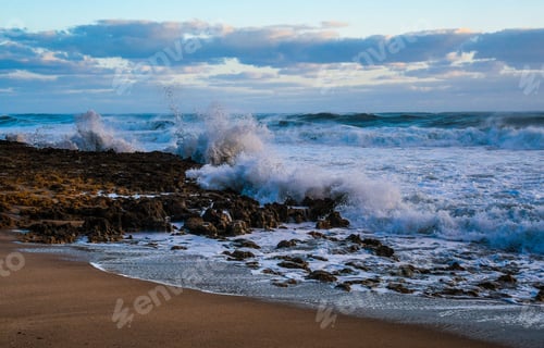 Preview: Large Waves Breaking On The Rocky Shore Of A Florida Beach
