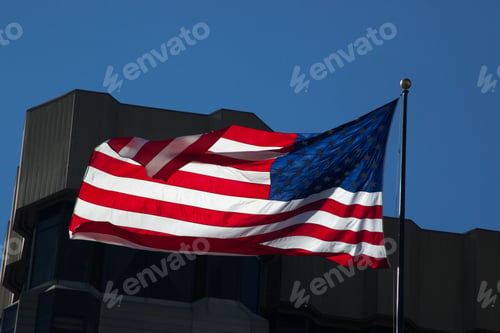 Preview: Us Flag Waving With A Building Background