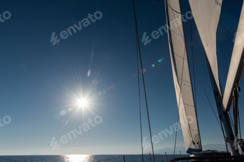 Preview: Sailing Towards Sunrise With Lens Flare And Islands On Horizon