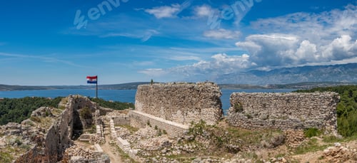 Preview: Croatian Flag Flies Above Ruins Of Old Venetian Fort Above The Coastal Town Of Novigrad In Croatia