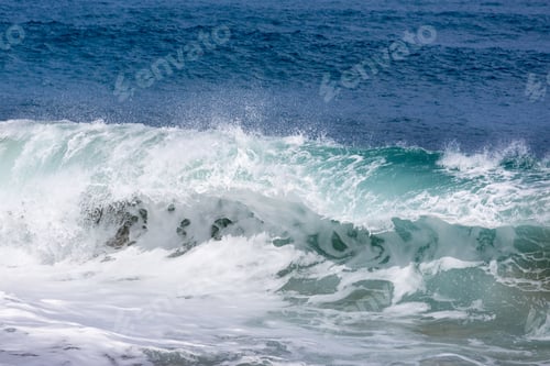 Preview: Frozen Motion Of Large Wave Or Breaker Approaching Shore And Short Shutter Speed Freezing The Water