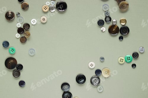 Preview: Multi Colored Clothes Sewing Buttons On Gray Background