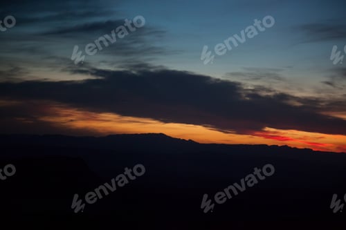 Preview: Desert Sunset With Mountains And Colorful Clouds