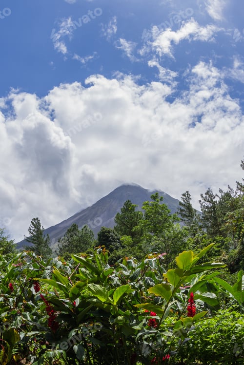Preview: Classic Cone Shape Volcano Surrounded By Lush Tropical Vegetation And Fast Moving Clouds In La