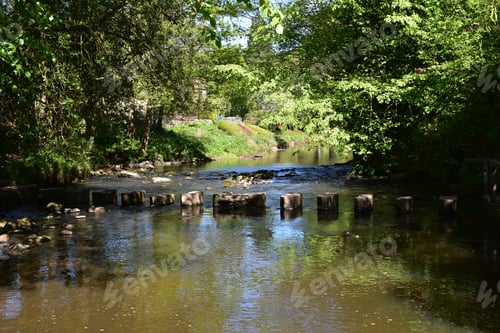 Preview: Large Limestone Stepping Stones Used To Cross Over A River In England.