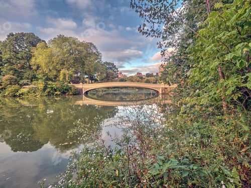 Preview: The Bow Bridge Is A Cast Iron Bridge Located In Central Park, New York City, Crossing Over The Lake