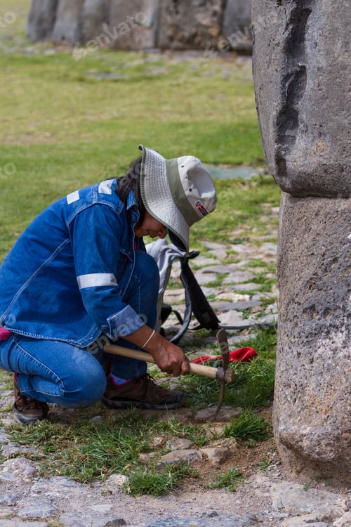 Preview: Cusco, Peru - May 14 : Woman Working On The Grounds The Ancient Site Of Saqsaywaman. May 14 2016
