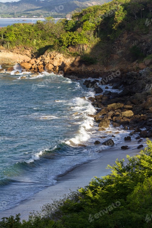 Preview: Close Up Of A Section Of Beach In Playa Redonda, Nicaragua With Waves Crashing Onto The Rocks In