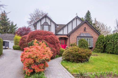 Preview: Beautiful Exterior Of Newly Built Luxury Home. Yard With Green Grass And Walkway Lead To Front
