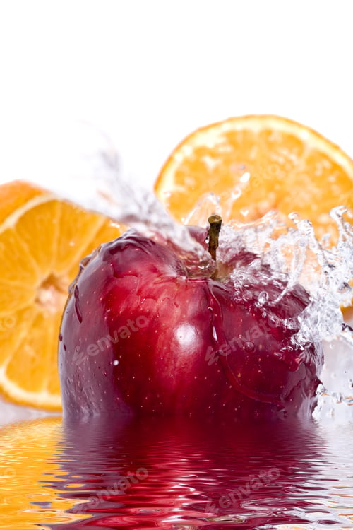 Preview: Water Splashing Down On An Apple And Orange