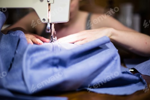 Preview: Woman Sewing