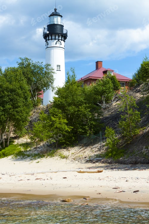 Preview: Old Lighthouse With Moody Sky
