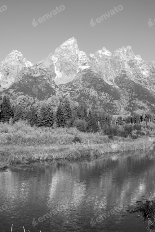 Preview: Teton Mountains Being Reflected In The River