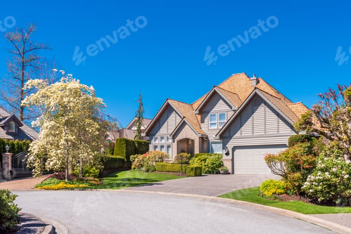 Preview: Beautiful Exterior Of Newly Built Luxury Home. Yard With Green Grass And Walkway Lead To Front