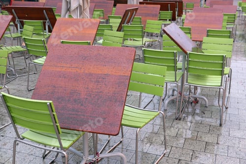 Preview: Empty Tables In A Café On A Rainy Day