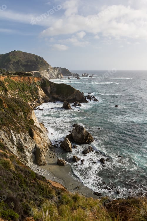 Preview: Dramatic Landscape Of The California Coast With Waves Splashing On The Cliffs And Rocks