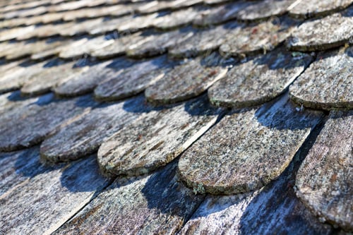 Preview: Closeup Of Traditional Rounded Wood Shingles On A Roof Selective Focus