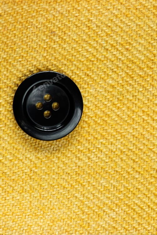 Preview: Shiny Black Button On A Yellow Gold Background Fabric Swatch