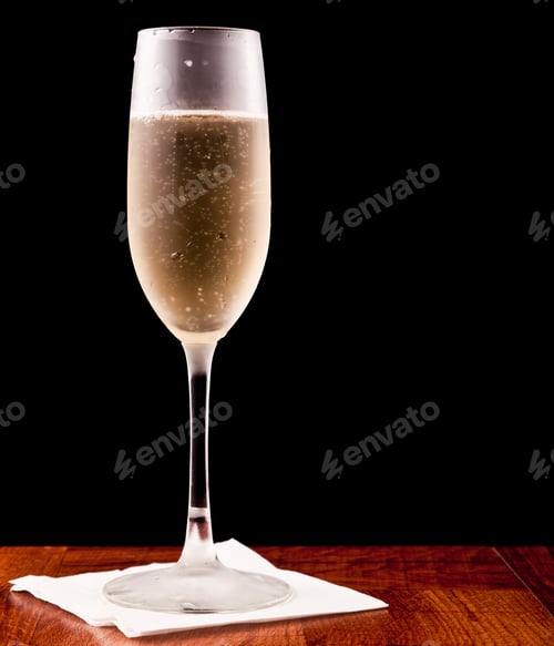 Preview: Champagne Flute Served With Sparkling Wine Isolated On A Black Background