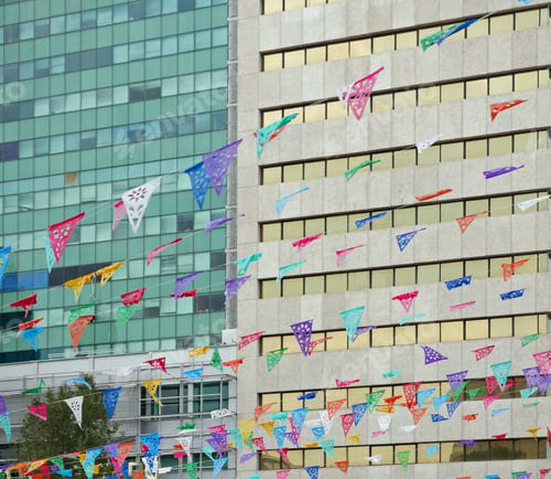 Preview: Rows Of Colorful Traditional Bunting In Front Of Modern Office Building Facades In Downtown