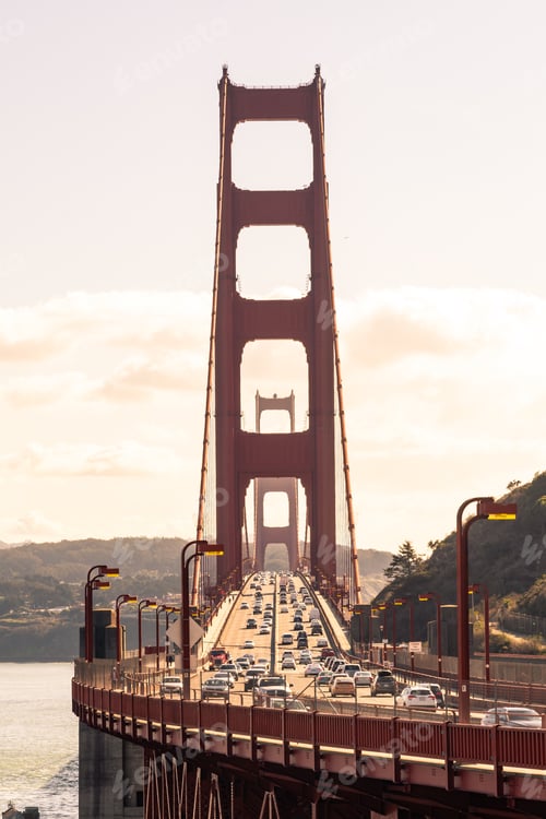 Preview: Traffic Crossing The Golden Gate Bridge On A Sunny Day. Famous Tourist Picture-Taking Spot.