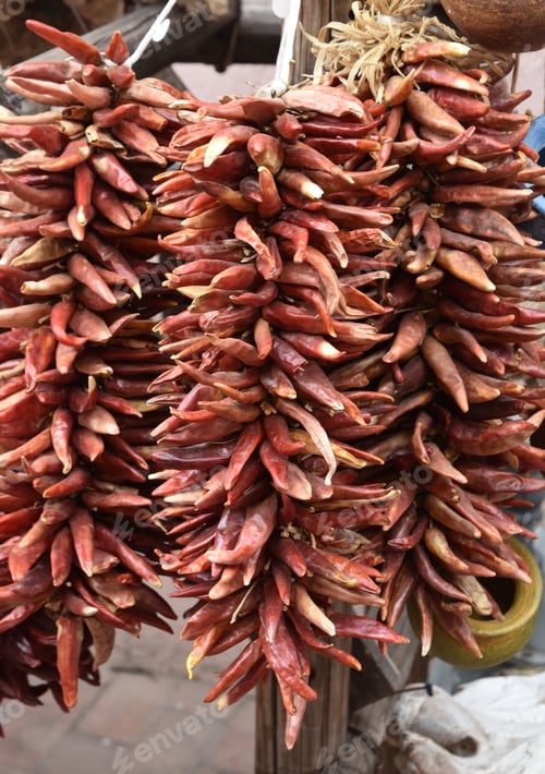 Preview: Red Chili Peppers Drying In The Sunshine.