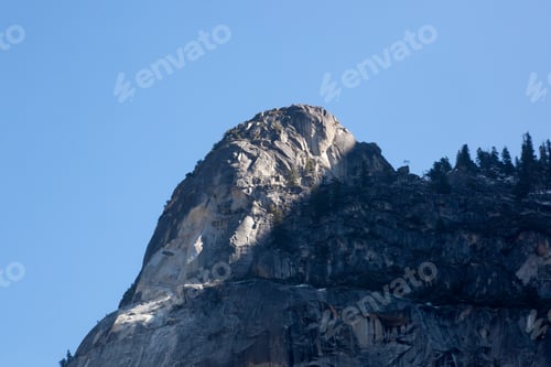 Preview: Mountain And Trees Of Yosemite Under A Blue Sky