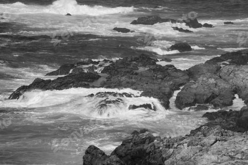 Preview: Waves Crashing On A Rocky Shore In Black And White