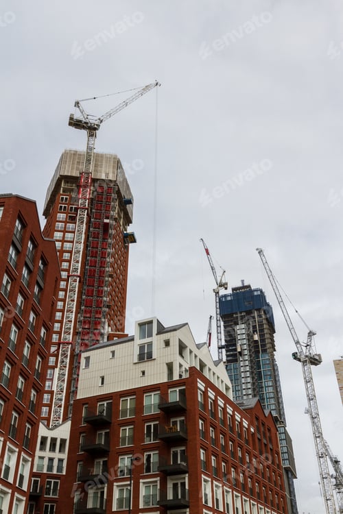 Preview: London - September 06 2019: Construction Cranes Busy At Work Erecting Tall Buildings Around The