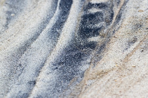 Preview: Close Up Of White Sand With Patches Of Dark Sand Found In A Pacific Beach Of Panama