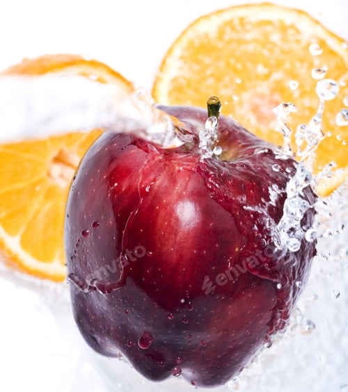 Preview: Water Splashing Down On An Apple And Oranges