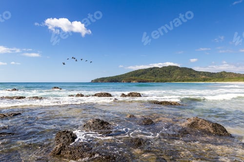 Preview: Tranquil Beach Scene With A Long Empty Sandy Beach In Playa Ventanas, Costa Rica