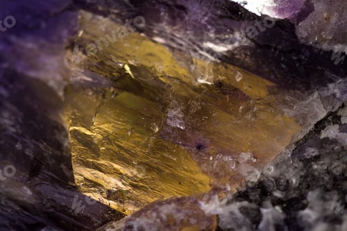 Preview: Close Up Of A Purple Fluorite Stone With A Patch Of A Golden Crystal Growing With It