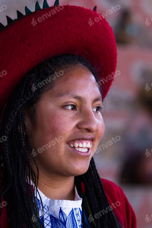 Preview: Chinchero Peru -May 18 : Portrait Of A Young Native Cusquena Woman Wearing Traditional Clothing