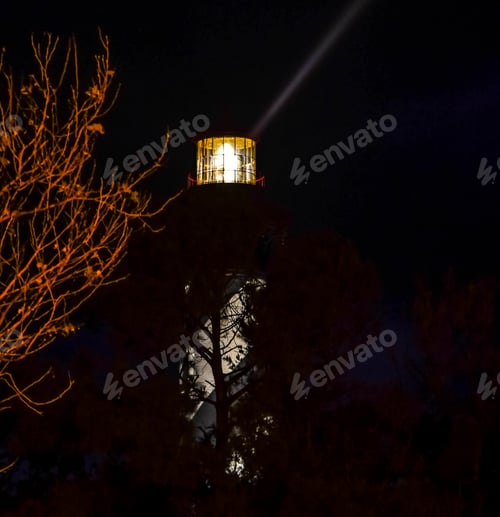 Preview: The St. Augustine, Florida Lighthouse At Night As The Beam Of The Lantern Shoots Into The Sky With