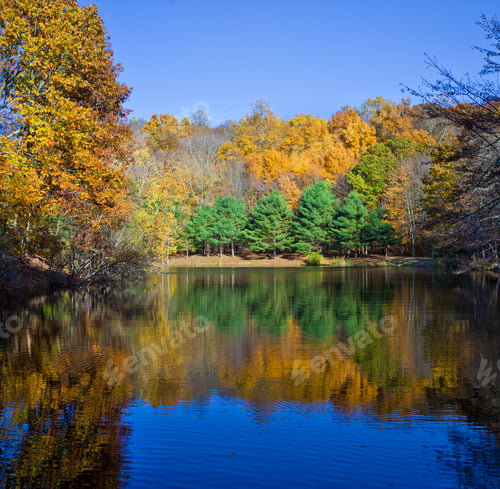 Preview: Stunning New England Lake In Fall With Blue Sky