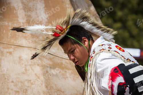 Preview: Crazy Horse Memorial, South Dakota - June 15 : Native American Performing For A Crowd In The Black