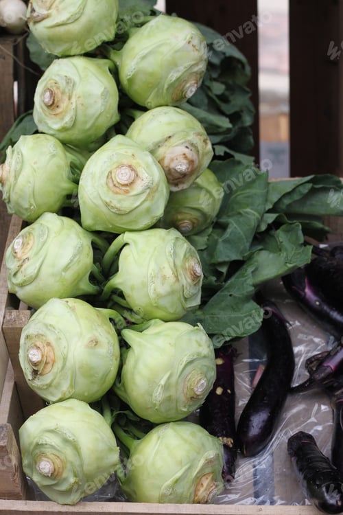 Preview: A Market Display Of Fresh Purple Eggplants And Other Vegetables 2970