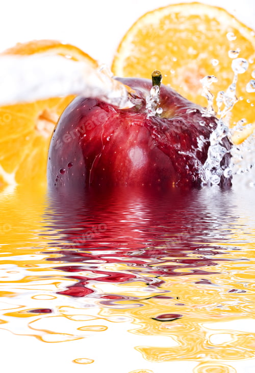 Preview: Water Splashing Down On An Apple And Oranges