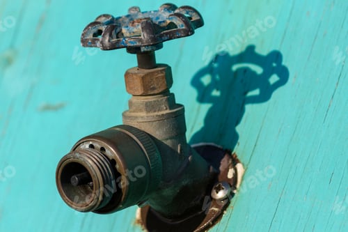 Preview: Old Faucets Spigots In Blue Turquoise Painted Plywood No Hose No Water Selective Focus
