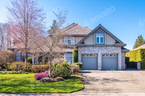 Preview: Beautiful Exterior Of Newly Built Luxury Home. Yard With Green Grass And Walkway Lead To Front