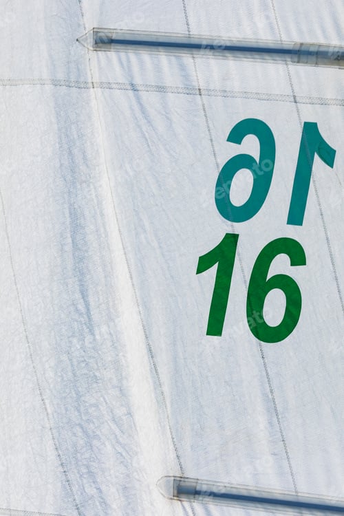 Preview: Closeup Of Boat Sails Filled In The Wind