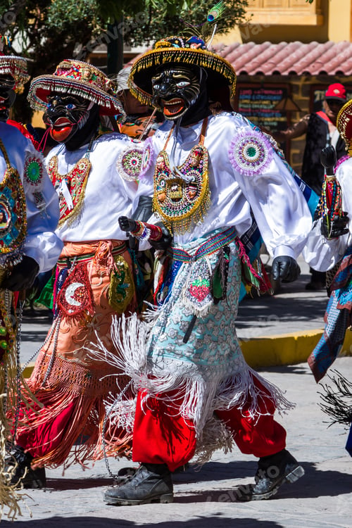 Preview: Ollantaytambo, Peru - May 16 : Religious Celebration For Fiestas De Pentecostes With People Wearing